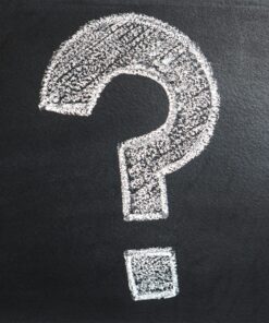 A conceptual image featuring a question mark drawn on a chalkboard, ideal for problem-solving contexts.